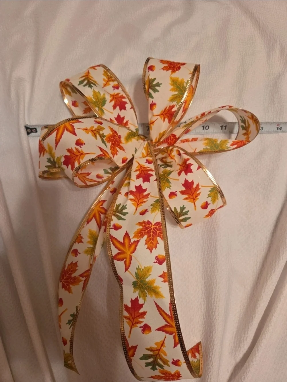 Festive Autumn Leaf Holiday Bow Ribbon - White with Orange, Red & Green Leaves